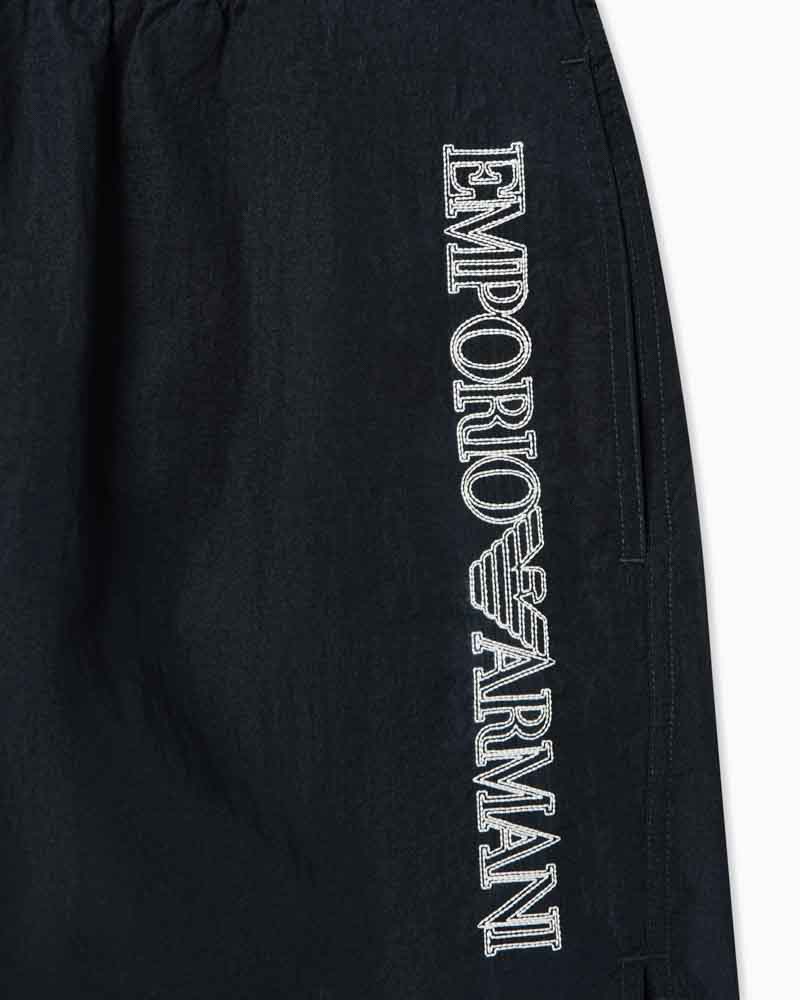 EMPORIO ARMANI boxer blu uomo da mare con scritta laterale a contrasto-1